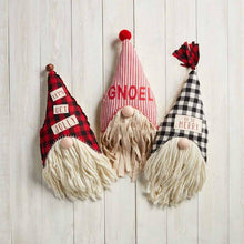 Load image into Gallery viewer, Three festive gnomes with yarn beards and hats reading LET&#39;S GET JOLLY!, NOEL, and OH SO MERRY sit on a white wooden background—the perfect companions for your Gnoel Gnome Pillow.