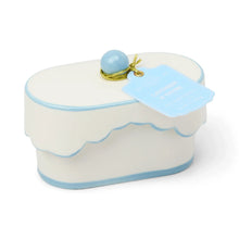 Load image into Gallery viewer, A small, white, oval 5.5oz Ceramic Dish Candle with light blue trim, scalloped edge, and a round blue knob on the lid. A blue tag reading "Paddywax Lavender &amp; Thyme" hangs from the knob with a gold cord.
