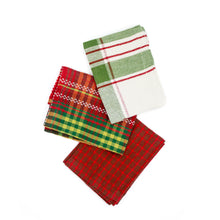 Load image into Gallery viewer, The Tree Board Gift Set features four folded kitchen towels in plaid and checkered red, green, yellow, and white patterns, adding festive charm to your decor and beautifully arranged on a white background.