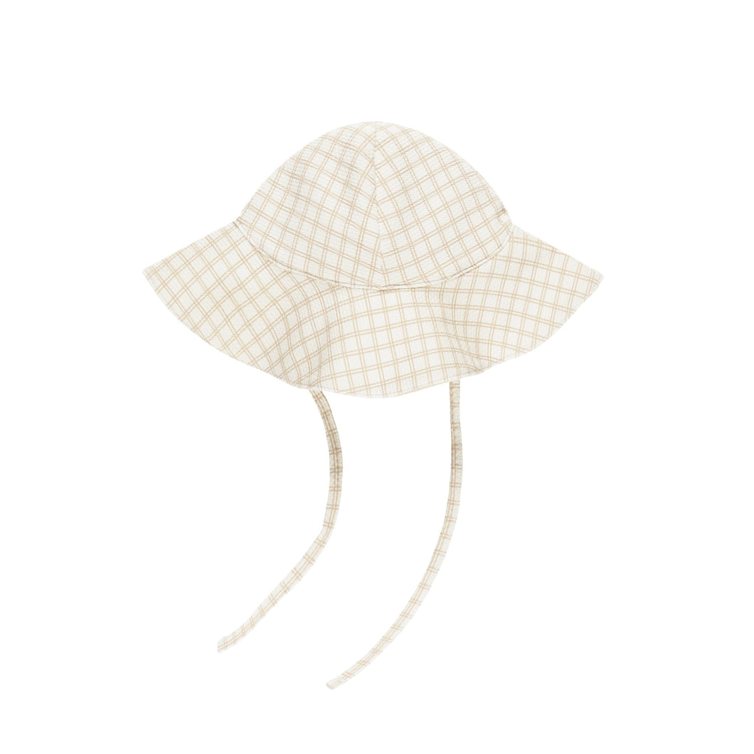 The Rylee & Cru Sun Hat (2 styles) features a beige and white checkered design, wide brim, two long chin straps, UPF 50+ swim fabric, and is shown on a plain white background.