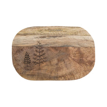 Load image into Gallery viewer, The Mango Wood Tree Cutting Board is a handcrafted rectangular mango wood board with rounded edges, two engraved pine trees of different sizes on the left, and a natural two-tone finish.