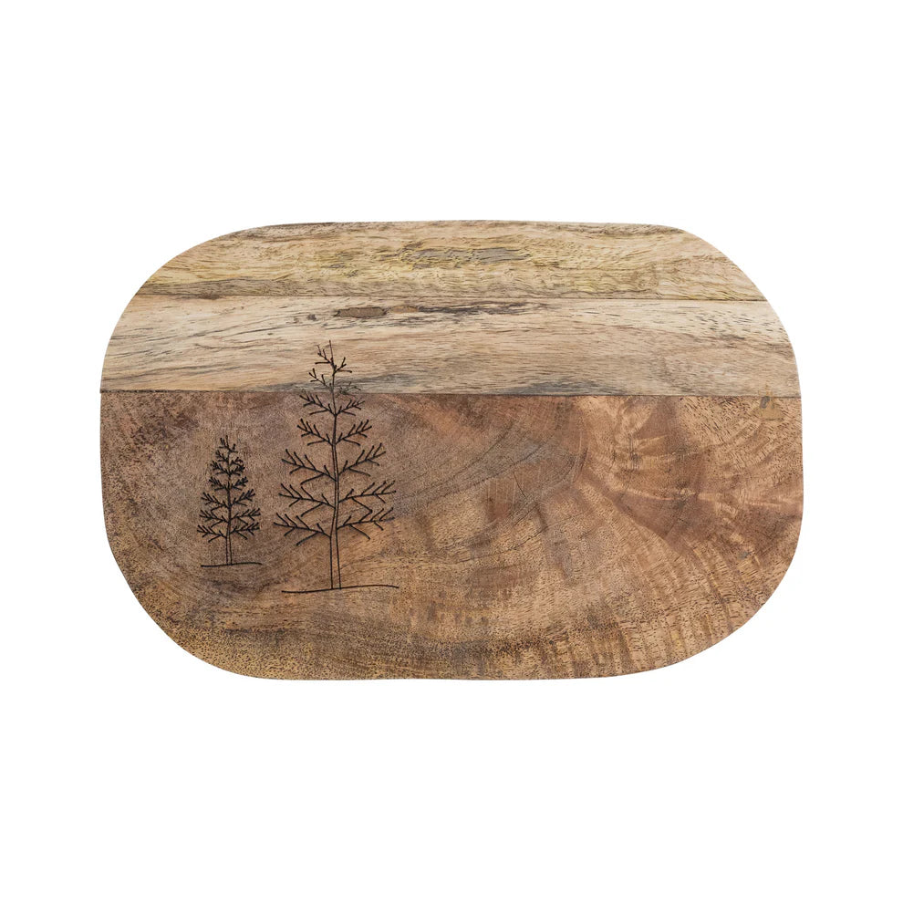 The Mango Wood Tree Cutting Board is a handcrafted rectangular mango wood board with rounded edges, two engraved pine trees of different sizes on the left, and a natural two-tone finish.