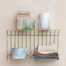 Load image into Gallery viewer, A metal wire wall shelf holds a blue ceramic mug, S/3 Dish Cloths w/ Colored Edge, a glass jar with green accents, a paper bag, and a rolled-up paper against a textured beige wall.