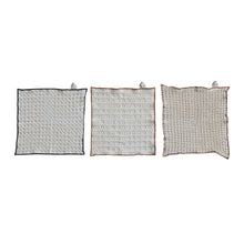 Load image into Gallery viewer, A set of three off-white Square Cotton Waffle Weave Dish Cloths, each with unique stitched patterns and colored edges, hang side by side on white loops. Product: S/3 Dish Cloths w/ Colored Edge.