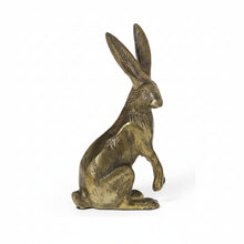 Load image into Gallery viewer, The Gold Rabbit, a brass sculpture finished in antiqued gold with upright ears, is a charming addition to Easter decor against a plain white background.