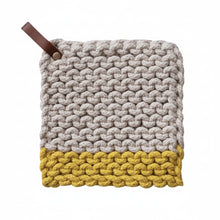 Load image into Gallery viewer, The Crocheted Pot Holder w/ Leather Strap (4 Styles) is a chunky, handcrafted cotton pot holder featuring a beige body, a thick yellow bottom band, and a looped brown leather strap for stylish kitchen heat protection.