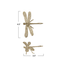Load image into Gallery viewer, Golden Dragonfly Figurine displayed from top and side views, measuring 4.5" long by 3.5" wide. Features intricate textured wings and a slender body—an eye-catching accent for your home decor.
