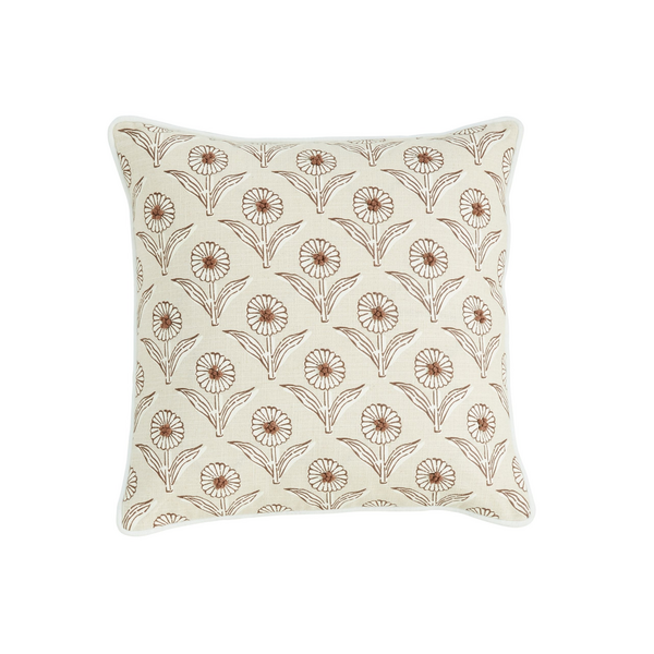 Mudpies Block Print Flower Knot Pillow, available in 2 styles, features a square beige design with a repeating brown floral pattern and elegant white piping, displayed on a plain white background.