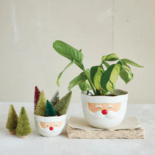 Load image into Gallery viewer, The Santa Mixing Bowl, styled with a festive plant and bottlebrush trees, brings holiday cheer and nostalgic charm to your space, inspired by the classic look of Santa during joyful holiday baking.