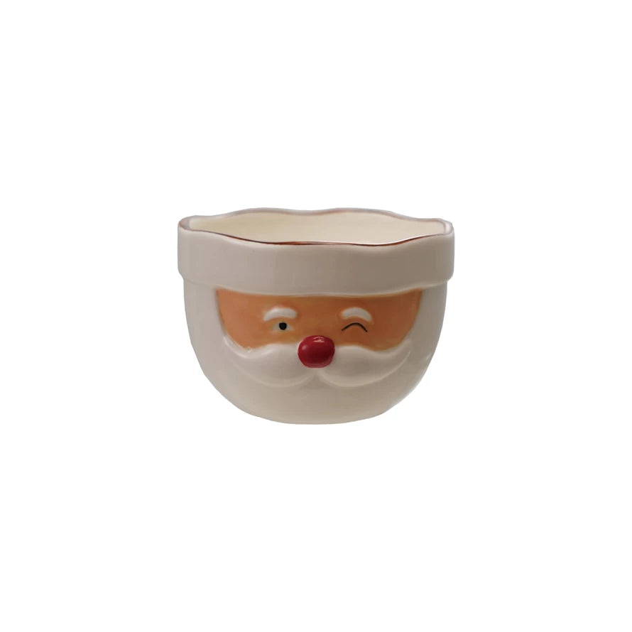 The Santa Mixing Bowl is a stoneware piece with a winking Santa face, red nose, white beard, and cream rim—perfect for bringing festive cheer to your holiday kitchen.