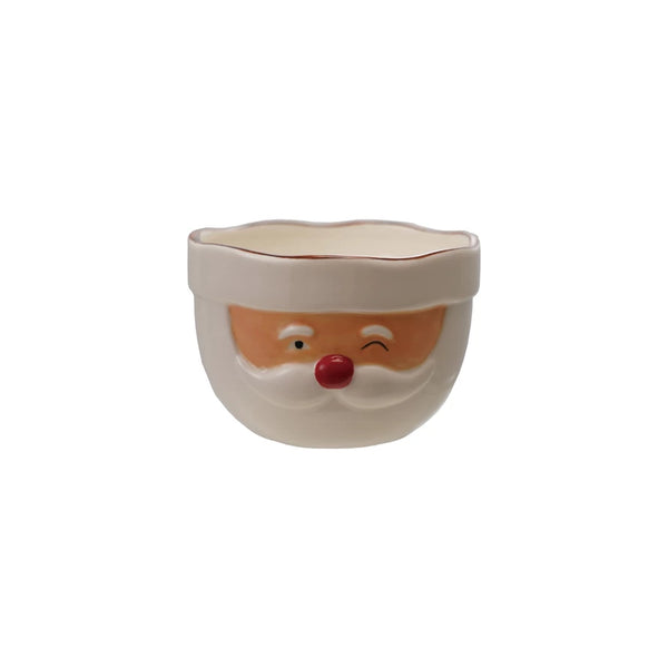 The Santa Mixing Bowl is a stoneware piece with a winking Santa face, red nose, white beard, and cream rim—perfect for bringing festive cheer to your holiday kitchen.