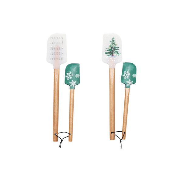 The S/2 Spatulas set includes two spatulas with sturdy wooden handles. Each silicone spatula is decorated with festive snowflakes or a Christmas tree, making them perfect for holiday baking and celebrations.